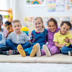 Preschoolers socializing and adjusting during the first month of preschool